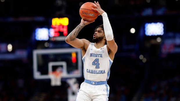 North Carolina Tar Heels guard RJ Davis (4) shoots the ball against the North Carolina State Wolfpack during the second half at Capital One Arena in Washington, D.C., on March 16, 2024.